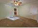 Bedroom with neutral wall color, carpet flooring, and ceiling fan with natural light from the windows at 3104 Archwood Way, Las Vegas, NV 89134