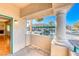 The condo's balcony with view into the condo and out toward the parking area, with stucco trim at 312 Manti Pl, Henderson, NV 89014