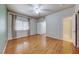 Bedroom with hardwood floors, ceiling fan, and natural light at 312 Manti Pl, Henderson, NV 89014