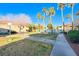 Well-maintained common area with sidewalk, lawn, and landscaping at 312 Manti Pl, Henderson, NV 89014