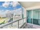 Spacious balcony with glass railings offering panoramic city views, creating an inviting outdoor living space at 322 Karen Ave # 1902, Las Vegas, NV 89109