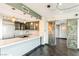 Modern kitchen featuring stainless steel appliances, a large island, and open access to a unique barn door at 322 Karen Ave # 1902, Las Vegas, NV 89109