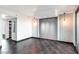 Bright and airy living room features dark tile flooring and modern lighting fixtures at 322 Karen Ave # 1902, Las Vegas, NV 89109