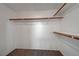 Walk-in closet with shelves and rails for optimal storage at 3705 Covewick Dr, North Las Vegas, NV 89032