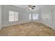 Spacious living room with neutral walls, tile flooring, and lots of natural light at 3705 Covewick Dr, North Las Vegas, NV 89032