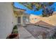 Private courtyard area with brick pavers and stucco walls, ideal for outdoor living at 3705 Covewick Dr, North Las Vegas, NV 89032