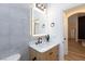 Modern bathroom featuring vanity with a light-up mirror and modern accents at 3957 Genoa Dr, Las Vegas, NV 89141