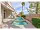 Backyard showcasing a swimming pool and spa, ideal for outdoor relaxation and enjoyment at 3957 Genoa Dr, Las Vegas, NV 89141