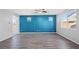 Spacious living room with wood floors and lots of light at 430 Shimmering Sands Ave, North Las Vegas, NV 89031