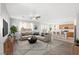 Open living room is light and bright, connected to kitchen and dining at 430 Shimmering Sands Ave, North Las Vegas, NV 89031