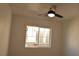 Bright bedroom with a modern ceiling fan and plenty of natural light at 4473 Oberlander Ave, North Las Vegas, NV 89031