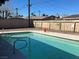 Backyard pool with mature landscaping, ready for summer fun at 4504 Cinderella Ln, Las Vegas, NV 89102