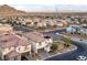 A scenic aerial view of a neighborhood and mountain views at 4504 Eagle Nest Peak St, Las Vegas, NV 89129