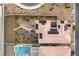 Birds-eye view showcases a solar panel installation, backyard, and pool at 4504 Eagle Nest Peak St, Las Vegas, NV 89129