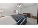 Bright bedroom with white walls, carpet, ceiling fan and closet with sliding doors at 4504 Eagle Nest Peak St, Las Vegas, NV 89129