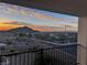 Balcony showcasing a view of a desert landscape at sunset at 4504 Eagle Nest Peak St, Las Vegas, NV 89129