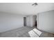 Neutral bedroom includes archway, closet and plush carpeting at 4839 Englewood Ave, Las Vegas, NV 89139