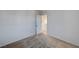 Neutral bedroom features carpet flooring and an open doorway to adjacent spaces at 4839 Englewood Ave, Las Vegas, NV 89139