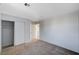 Neutral bedroom includes closet and plush neutral carpeting at 4839 Englewood Ave, Las Vegas, NV 89139