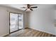 Cozy dining area with ceiling fan and sliding glass door to patio at 4839 Englewood Ave, Las Vegas, NV 89139