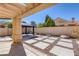 View of backyard with covered patio, gazebo, pavers and low maintenance landscaping at 4925 Turtle Point Dr, Las Vegas, NV 89113