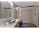 Modern bathroom with a glass shower, vessel sink, and contemporary finishes at 4925 Turtle Point Dr, Las Vegas, NV 89113