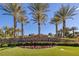 Spanish Trail community sign surrounded by manicured landscaping and palm trees at 4925 Turtle Point Dr, Las Vegas, NV 89113