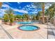 Relaxing pool area with spa and cabanas surrounded by lush greenery, offering a serene escape at 4925 Turtle Point Dr, Las Vegas, NV 89113