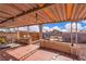 Inviting covered patio with brick flooring offering shade and an outdoor space at 5125 Hallet Dr, Las Vegas, NV 89122