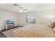 Bedroom showcases a cozy atmosphere with a TV for entertainment and relaxation at 513 Rafkin Pl, Henderson, NV 89052