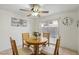 Bright dining room with a sliding door leading to an outdoor space at 513 Rafkin Pl, Henderson, NV 89052