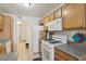 Functional kitchen featuring wooden cabinets and modern appliances at 513 Rafkin Pl, Henderson, NV 89052