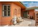 Charming front courtyard featuring unique decor, a bench, and a tranquil atmosphere at 5323 Taravilla Cir, Las Vegas, NV 89146