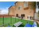 Backyard with dog run, artificial turf, and outdoor grill at 5850 Sonoma Station Ave, Las Vegas, NV 89139