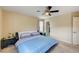 Spacious bedroom with ceiling fan and ample natural light at 5850 Sonoma Station Ave, Las Vegas, NV 89139