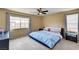 Comfortable bedroom with ceiling fan and natural light at 5850 Sonoma Station Ave, Las Vegas, NV 89139