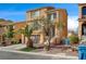 Beautiful two-story house featuring desert landscaping, a two-car garage and a private entrance at 5850 Sonoma Station Ave, Las Vegas, NV 89139