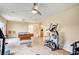 Bright bonus room includes exercise space and a billiard table at 5850 Sonoma Station Ave, Las Vegas, NV 89139