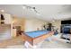 Finished basement area with pool table and exercise equipment at 5850 Sonoma Station Ave, Las Vegas, NV 89139