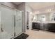 Bathroom featuring a glass shower, dual sink vanity, and neutral paint at 6156 Ava Ridge Ave, Las Vegas, NV 89141