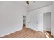 Bedroom featuring wood-look laminate floors, a closet and a bathroom at 6664 Rutgers Dr, Las Vegas, NV 89156