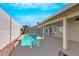 Backyard pool with a covered patio offers an ideal space for relaxing and outdoor entertaining at 6664 Rutgers Dr, Las Vegas, NV 89156