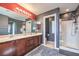 Spacious bathroom with double sink vanity and walk-in shower at 6687 Higger Tor Ave, Las Vegas, NV 89139