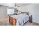 Traditional bedroom with ceiling fan, soft carpet, and large window at 6687 Higger Tor Ave, Las Vegas, NV 89139