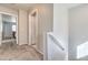 Upstairs hallway with carpeting leading to various rooms, showcasing the flow of the house at 6687 Higger Tor Ave, Las Vegas, NV 89139