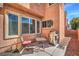 Cozy outdoor patio featuring a grill and space for a small table and chairs at 6687 Higger Tor Ave, Las Vegas, NV 89139