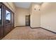 Bedroom featuring double doors, a large rug, and wood accents at 6760 Hinson St, Las Vegas, NV 89118