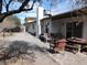 Backyard featuring a patio with outdoor seating and a well-maintained landscape at 710 Strawberry Pl, Henderson, NV 89002