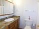 Functional bathroom featuring a vanity with storage, toilet and shower at 710 Strawberry Pl, Henderson, NV 89002