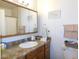 Clean bathroom featuring modern vanity, ample storage, and neutral decor for a fresh and inviting space at 710 Strawberry Pl, Henderson, NV 89002